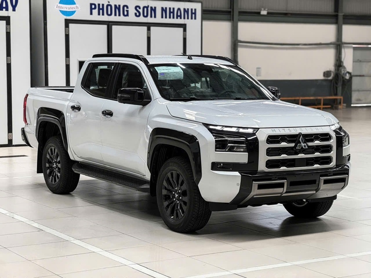 Xe Mitsubishi Triton